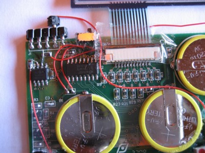 Close-up showing circuit mods to their PCB